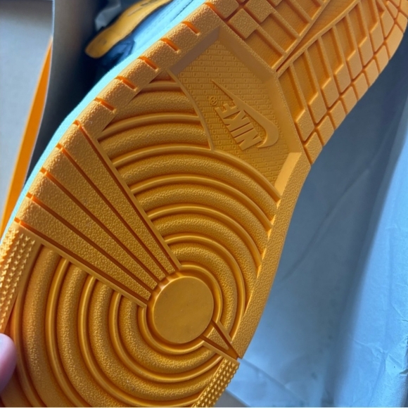 Nike  Jordan 1 Taxi Black and Orange Athletic High-Top Shoes